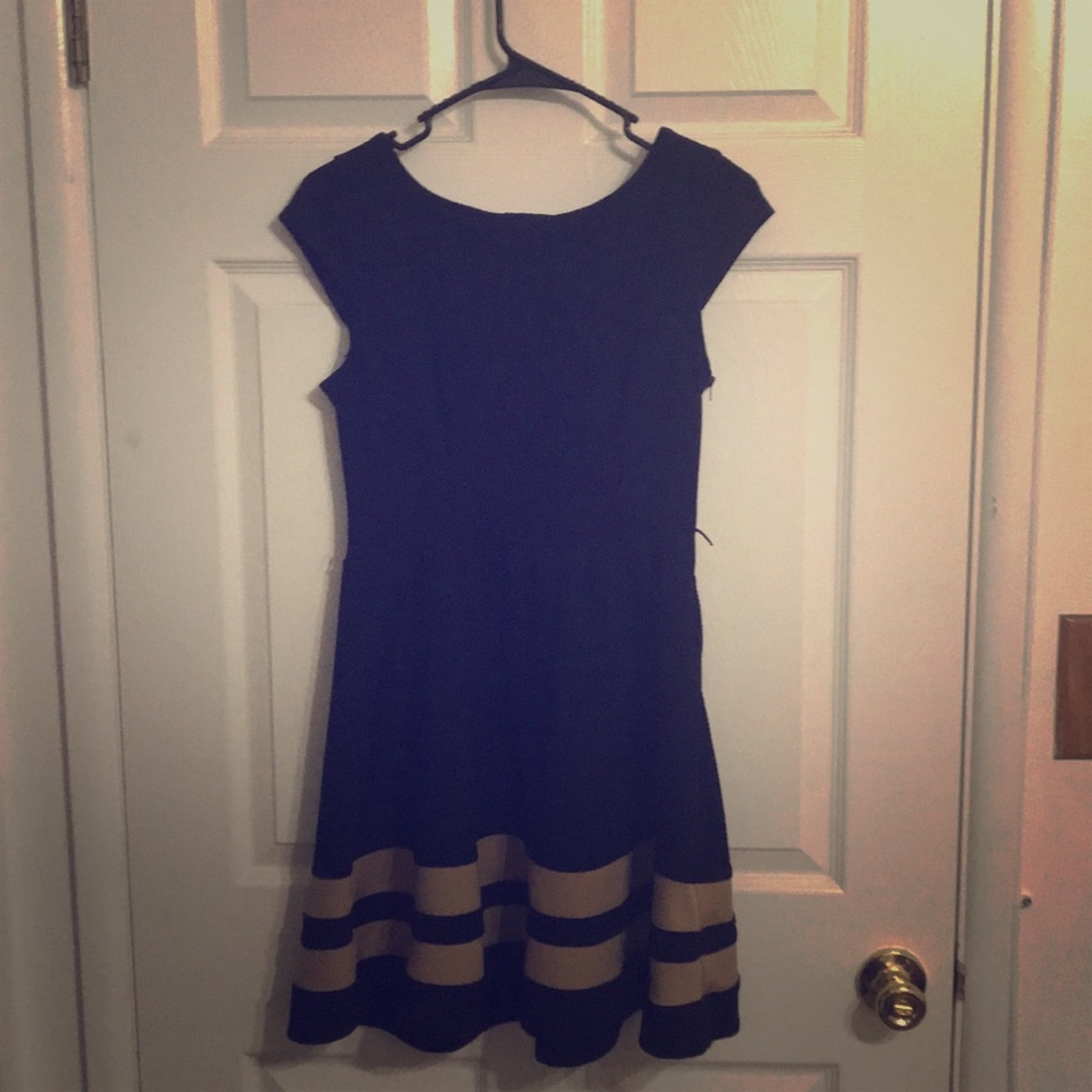 Black dress with two horizontal tan stripes